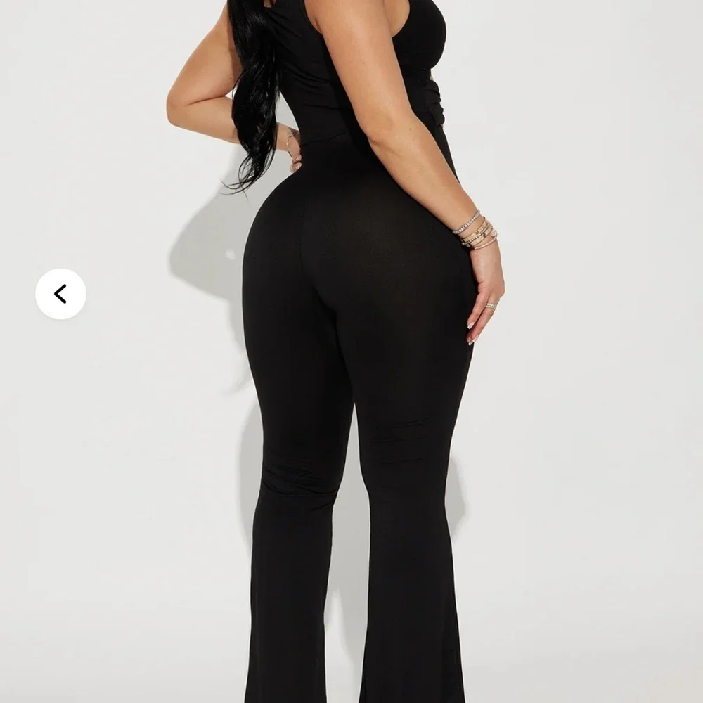 Fashion Nova Black Flared Cutout Jumpsuit - Picture 4 of 4